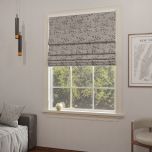 Roman blind in natural matte color with pattern of flowers and leaves