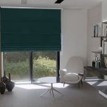 Elegant Roman blind in stylish turquoise teal velvet