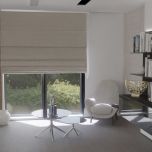 Blackout Roman blind in matt dark beige