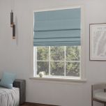 Light blue blackout Roman blind in matt