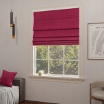 Elegant Roman blind in stylish light shiny fuchsia velvet
