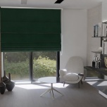Elegant Roman blind in stylish bottle green velvet