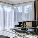 Modern curtain with matte white delicate rainbow 