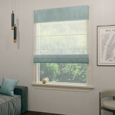 A voile roman blind, dual fabric, sewn to size. Curtain fabric inside, upper and lower segments in light denim.