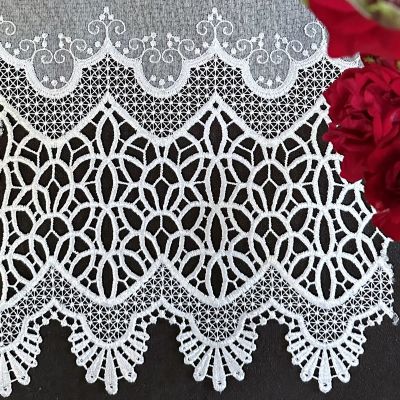 Stylish elegant curtain with white guipure ornamental pattern 