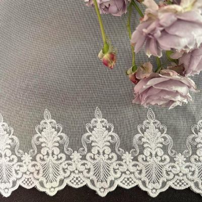 Subtle curtain with cream-colored embroidered bottom ornamental 