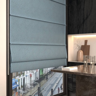 Light blue blackout Roman blind in matt