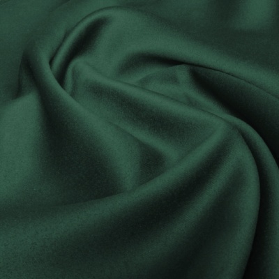 Emerald green blackout Roman blind in matt
